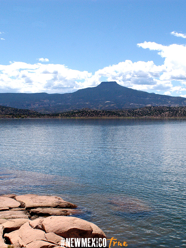 Abiquiu Lake Blue Water with Mountain Mesa in background