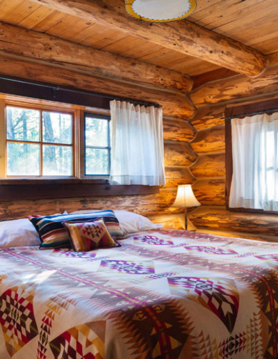 Bunk Beds in Loog Cabin with Ladder and A frame ceiling