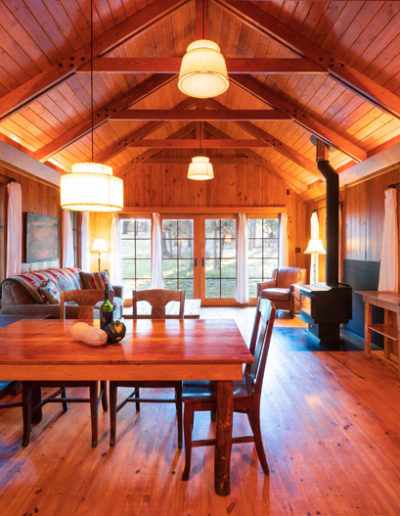 A view of the living room and dining area of the Penasco cabin