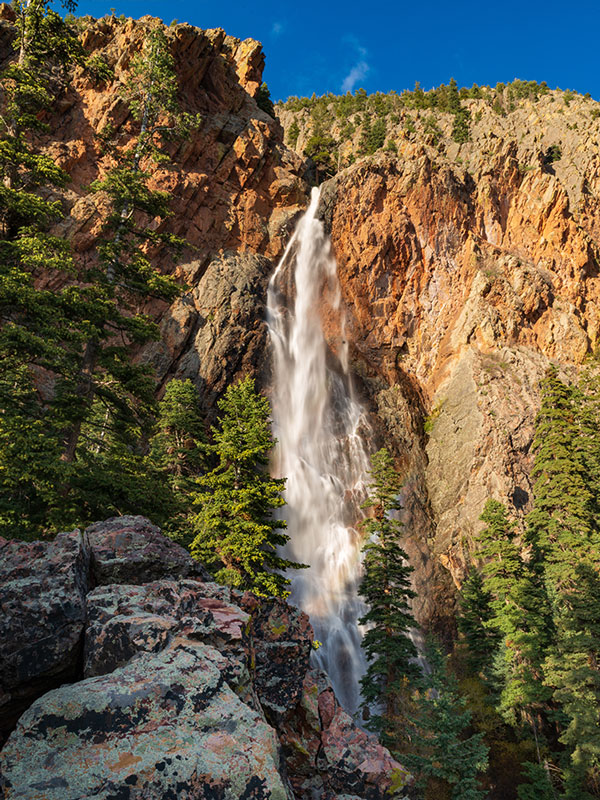 Brazos Falls waterfall flowing down steep cliffs