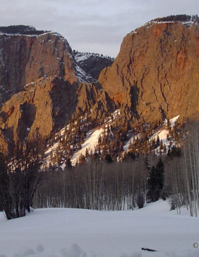 Brazos cliffs at sunset with a snowy landscape
